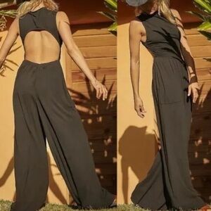 Free people Beach black jumpsuit back cut mock neck wide leg size M used